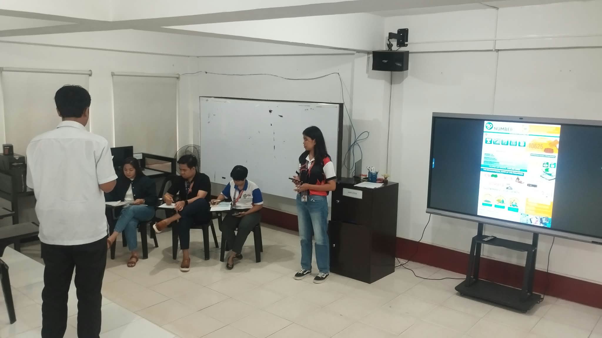 Participant delivering data interpretation defense to the panel