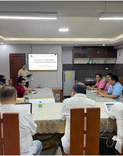 Research Director Ryan C. Fontanilla and IT Dean Engr. Myke Albert Tejada during the presentation of the Catholic Christianity Study