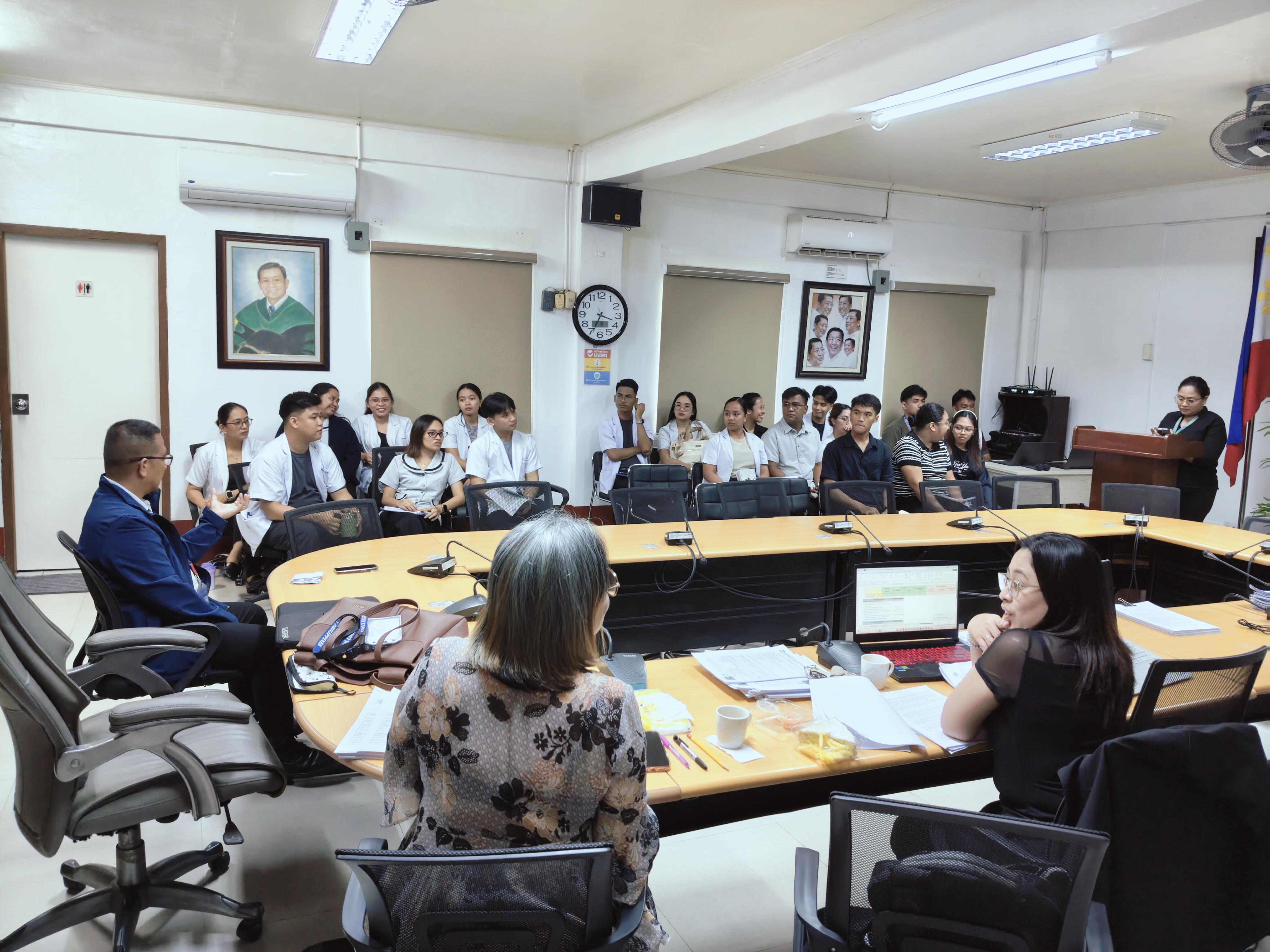 Faculty researchers defending proposal before the technical panel