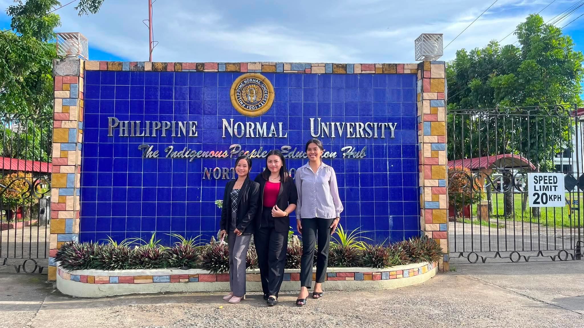 RDC delegates at the entrance landmark of Philippine Normal University North Luzon, Alicia, Isabela
