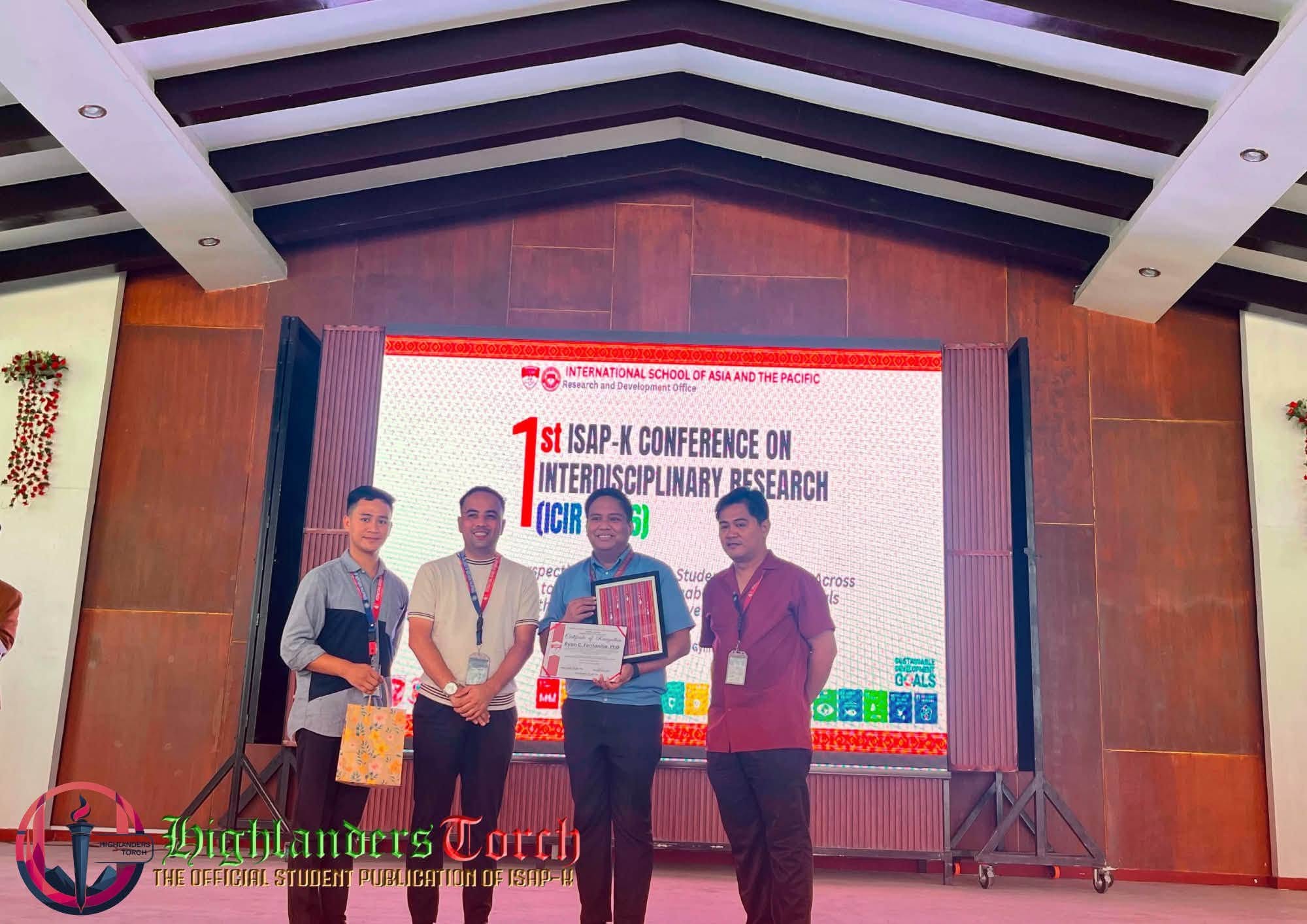 Awarding of Certificate of Recognition to Keynote Speaker Dr. Ryan C. Fontanilla on stage