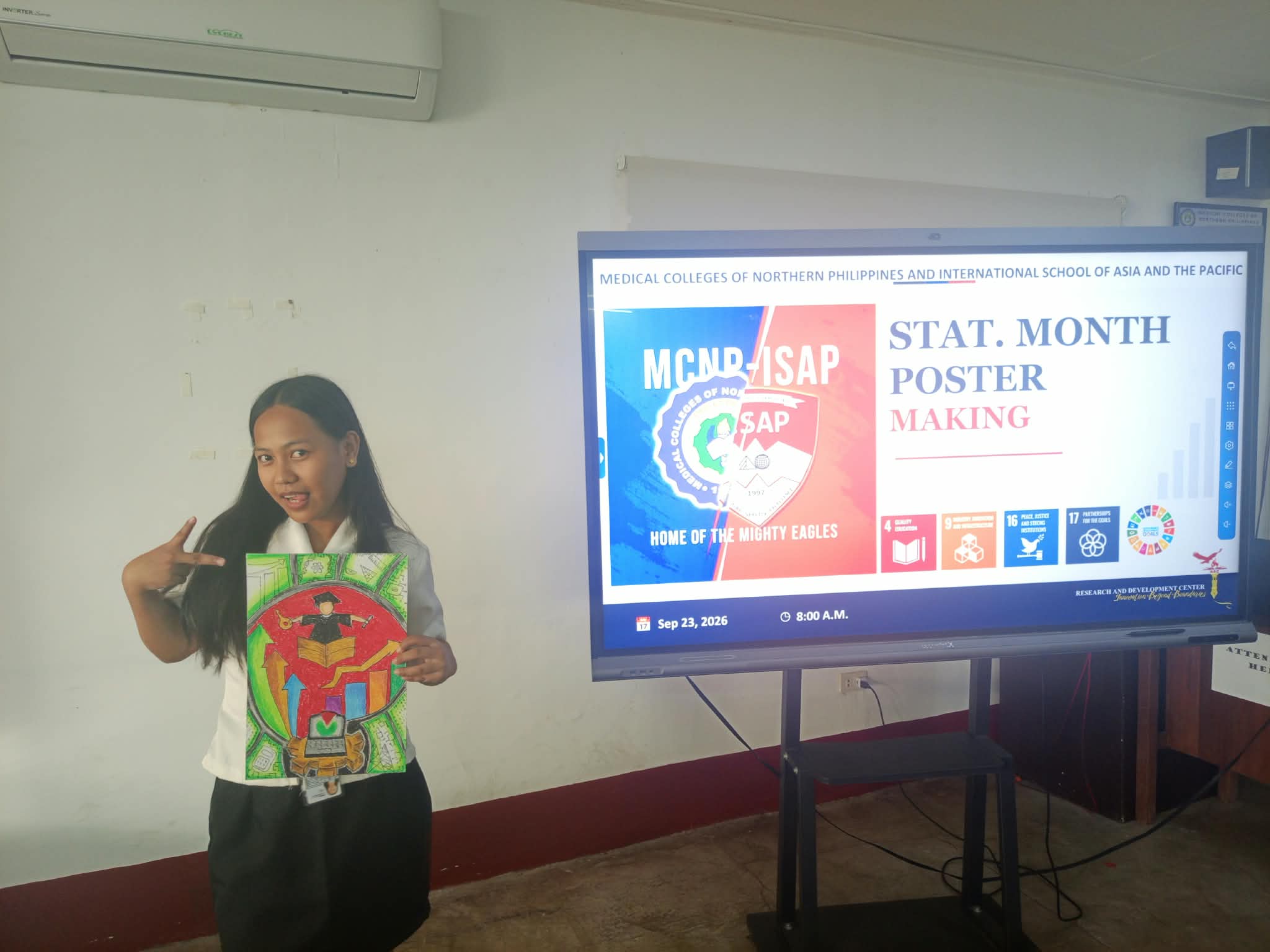 Student contestant with completed poster entry