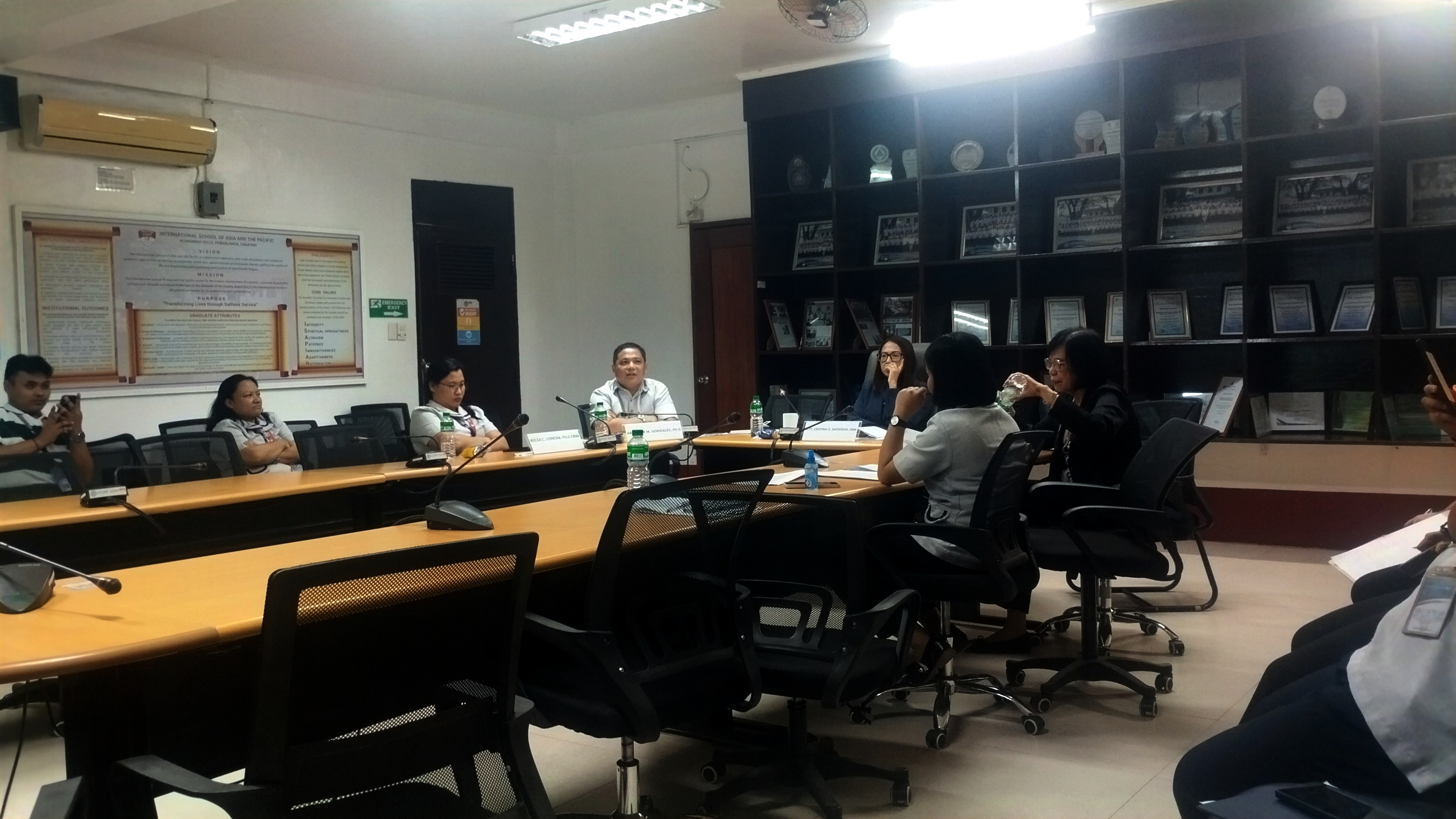 High School Department academic heads presenting institutional research proposals