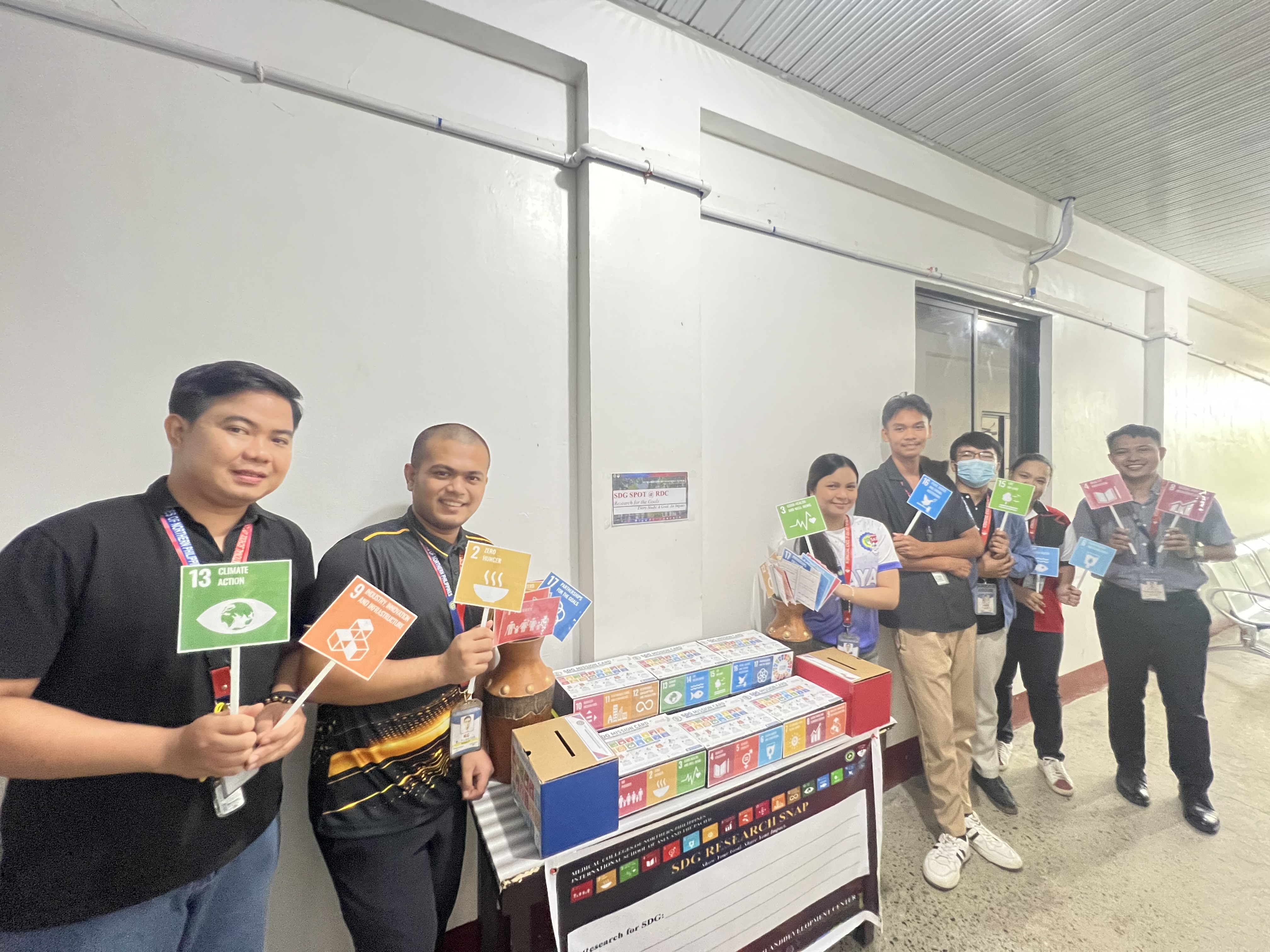 SDG Corner participants taking commitment photos