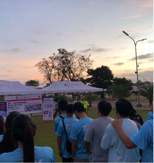Early morning participant assembly at the PSA event grounds